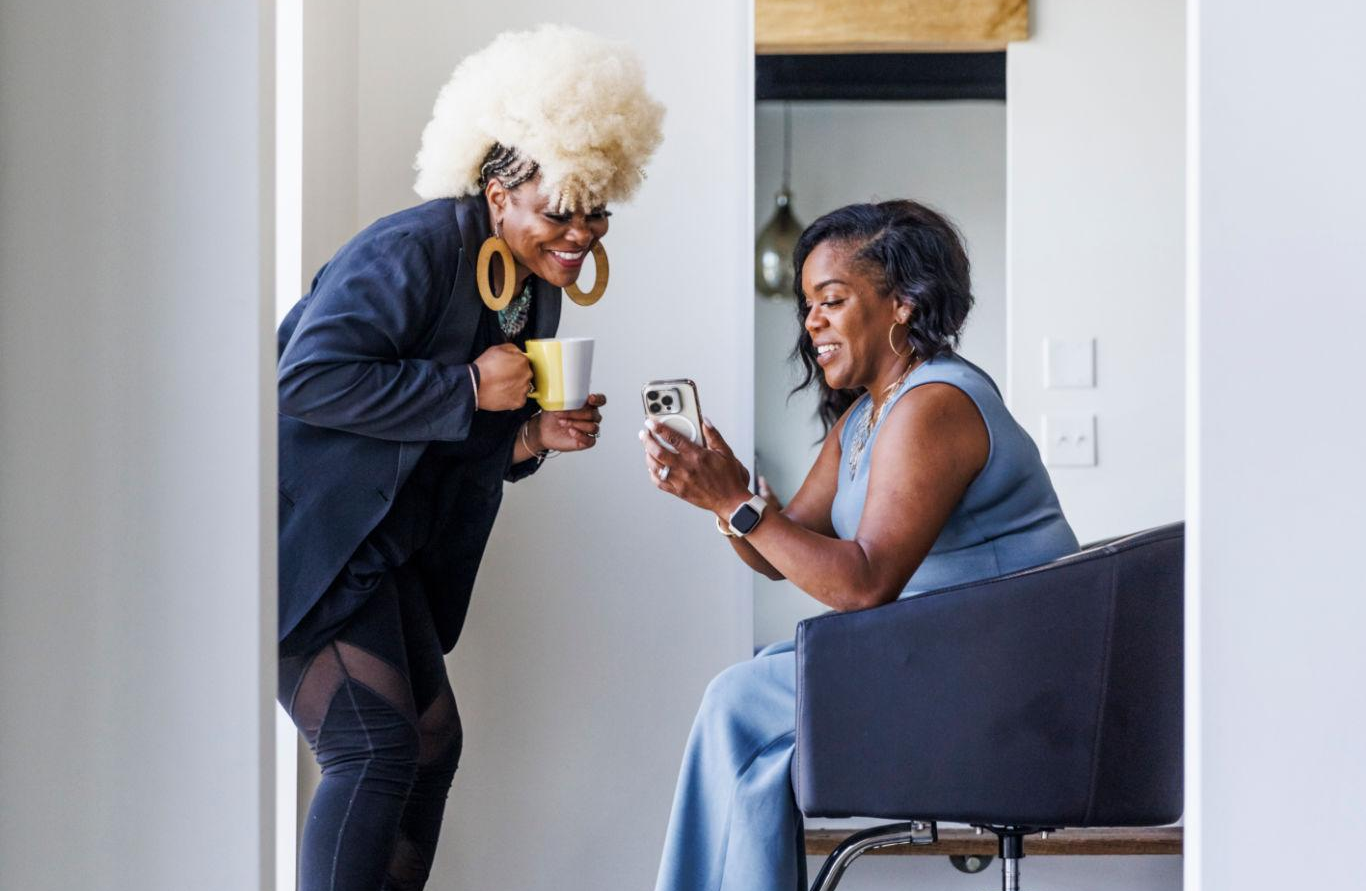 A confident salon professional with a loyal client