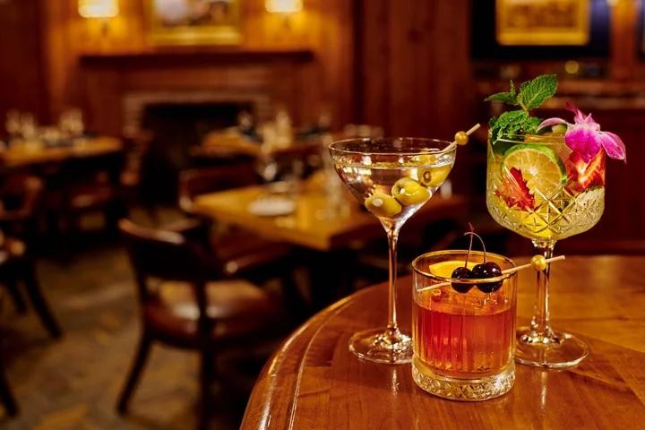 Cocktails displayed inside a restaurant Cocktails displayed inside a restaurant